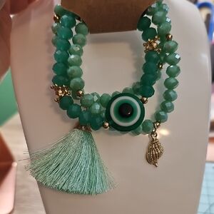 Green Beaded Bracelet Set with Tassel and Charm